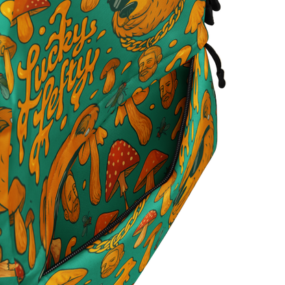 Patterned bag with mushrooms and text on a teal background